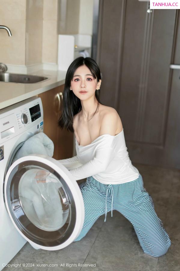   [XiuRen]高清写真图 2024.12.16 No.9605 奶芙乔乔 美腿黑丝第25张图片